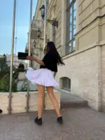 Міні спідниця з шортами та клинами біла