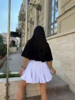 Міні спідниця з шортами та клинами біла