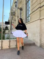 Міні спідниця з шортами та клинами біла