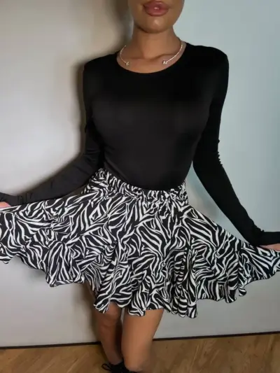 Міні спідниця з шортами та клинами принт зебра чорна