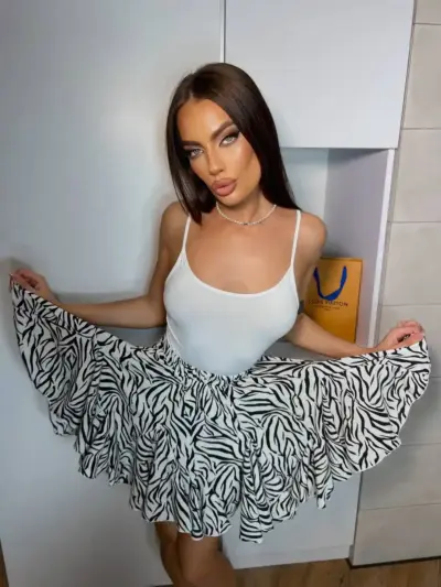 Міні спідниця з шортами та клинами принт зебра біла