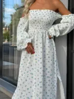 Довга муслінова сукня білого кольору в дрібну блакитну квітку