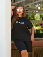 Жіночий спортивний костюм з шортами чорного кольору