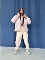 Пуховик жіночий довгий бежевого кольору 00324