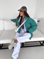 Пуховик жіночий довгий зеленого кольору 00323