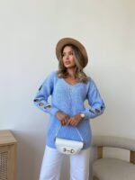 Светр жіночий з прорізами блакитний 00335