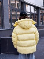 Пуховик жіночий оверсайз жовтого кольору 00425