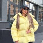 Пуховик жіночий оверсайз жовтого кольору 00425