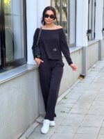 Жіночий костюм зі спущеним плечем чорного кольору 00501