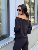 Жіночий костюм зі спущеним плечем чорного кольору 00501