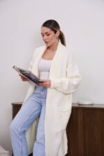 Жіночий кардиган з плетеним поясом молочного кольору 00604