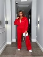 Жіночий трикотажний костюм кофта на блискавці та штани палаццо червоного кольору 00522