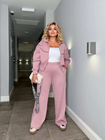 Жіночий трикотажний костюм кофта на блискавці та штани палаццо кольору пудра 00523