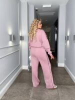 Жіночий трикотажний костюм кофта на блискавці та штани палаццо кольору пудра 00523